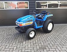 Iseki TU 155 minitrekker op brede gazonbanden Iseki TU 155 minitrekker op brede gazonbanden